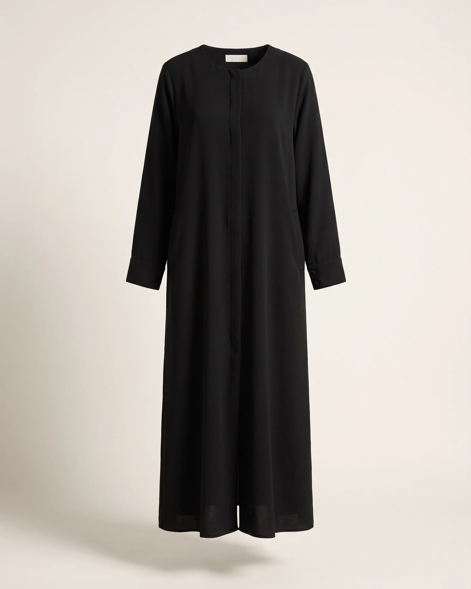 Abaya fermée à boutons cachés